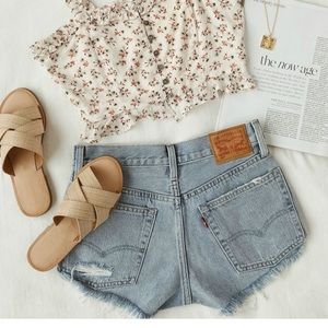 Levi’s 501 light wash distressed denim shorts